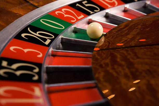 Live roulette table with spinning wheel and betting interface display
