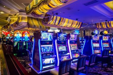 Wild Coaster slot game display on rupiah showing five reels with coaster-themed symbols and multiplier meter